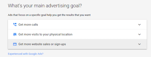 Google Ads setting screen for advertising goal selection choosing sales or sign-ups