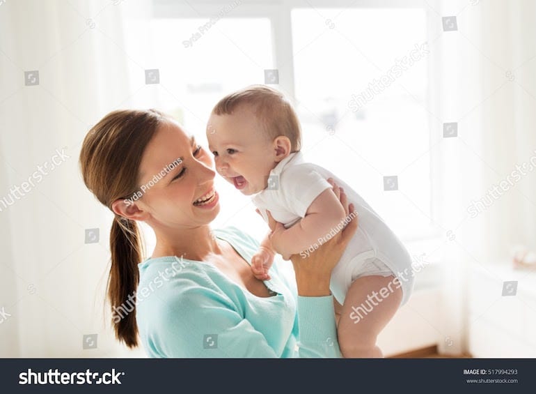 stock photo family with baby smiling